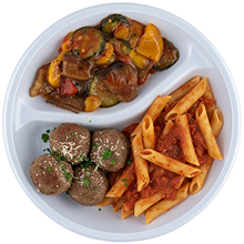 meatballs and penne pasta with tomatoe sauce, sauteed vegetable medley
